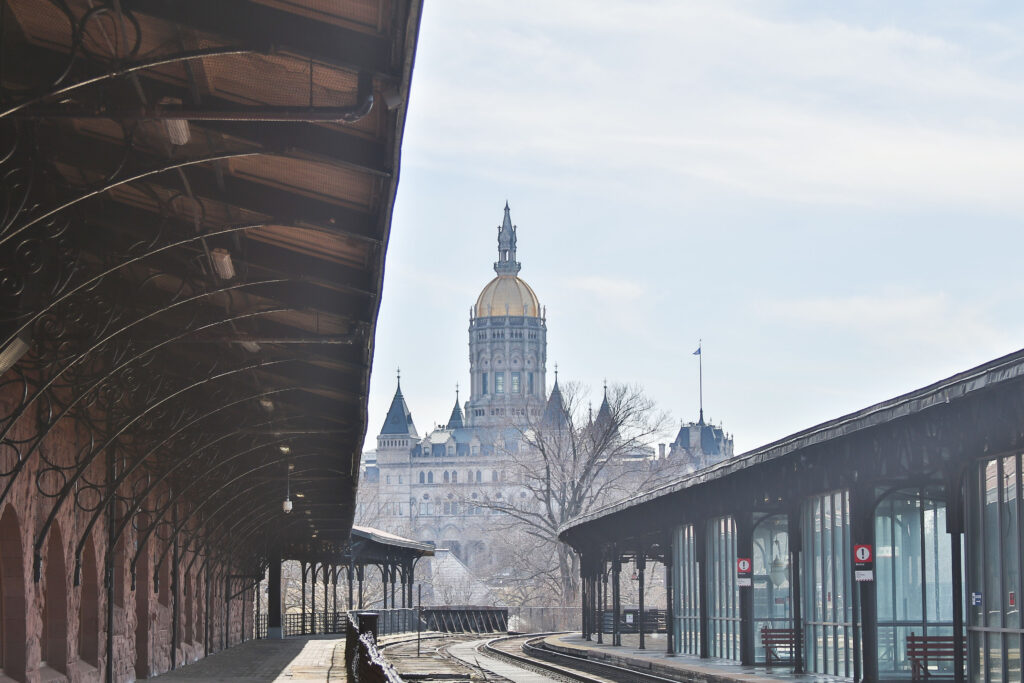 Image of Hartford Union Station with the planform in the foreground and the CT Capital in the background.